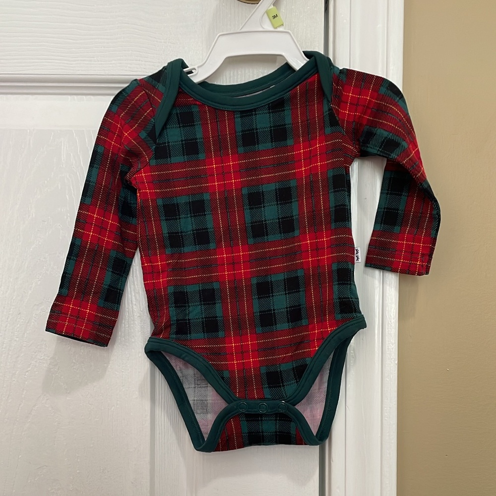 Newborn. Little Sleepies bamboo bodysuit. New without tags.